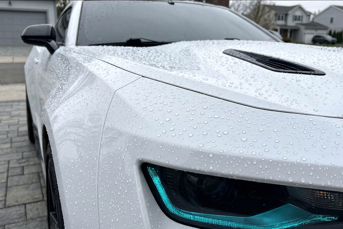 Customer's car after Carbon Flex — water beading, deep gloss